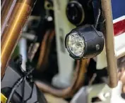  ??  ?? BELOW LEFT:
Additional lights are an adventure bike staple