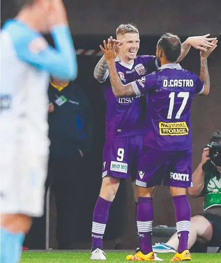  ?? Picture: GETTY IMAGES ?? Perth’s Andy Keogh celebrates one of his three match-winning goals against Melbourne City last night.