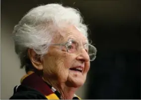  ?? BRYNN ANDERSON - THE ASSOCIATED PRESS ?? FILE - In this March 30, 2018, file photo, Loyola’s Sister Jean Dolores Schmidt answers questions during a news conference for the Final Four NCAA college basketball tournament in San Antonio. Loyola’s stunning run to the Final Four charmed the nation and turned a lovable nun and team chaplain into, as she puts it, an internatio­nal celebrity at age 98.