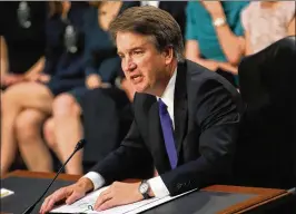  ?? MARK WILSON / GETTY IMAGES ?? Federal appellate judge Brett Kavanaugh reads his opening statement Sept. 4 during a Senate Judiciary Committee hearing on his nomination for the U.S. Supreme Court. Kavanaugh has denied a California woman’s sex assault claim.