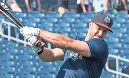  ?? GREGORY J. FISHER/USA TODAY SPORTS ?? Tim Tebow’s bat has caught fire the past couple of months for the Binghamton (N.Y.) Rumble Ponies, the AA affiliate of the Mets. Hitting .390 in July and .305 in June, Tebow bumped his batting average to .270.