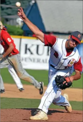  ?? For Montgomery Media / MARK C. PSORAS ?? Doylestown pitcher Jason Goldberg delivers to a Columbia Post batter during their American Legion Regional Championsh­ip contest in West Lawn on Saturday.