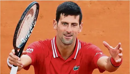  ?? — AFP ?? Thank you: Novak Djokovic reacts after beating Jannik Sinner in the second round of the Monte-Carlo ATP tournament in Monaco on Wednesday.