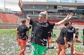  ??  ?? Dash goalkeeper Jane Campbell celebrates Sunday after the team’s win in the Challenge Cup title game against the Red Stars.