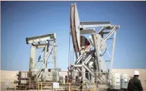  ?? — Reuters ?? Pump jacks drill for oil in the Monterey Shale, California, US.