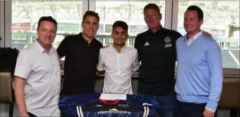  ??  ?? New Bethlehem Steel signing Selmir Miscic, center, poses with, from left, Union Academy director Tommy Wilson, Union technical director Chris Albright, Union coach Jim Curtin and Steel coach Brendan Burke.