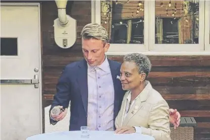  ?? INSTAGRAM ?? Carmen A. Rossi and Mayor Lori Lightfoot at an undated event. Rossi asked a city official for help securing business licenses for one of his companies, but he wasn’t registered as a lobbyist for that firm.