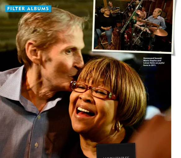  ?? ?? Homeward bound: Mavis Staples and Levon Helm on joyful form in 2011.