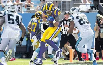  ?? Wally Skalij Los Angeles Times ?? TYLER HIGBEE, catching a fourth-quarter touchdown pass at Carolina in the Rams’ season opener, suffered a bruised lung in Sunday’s win over New Orleans and is “day to day” heading into next weekend at Cleveland.