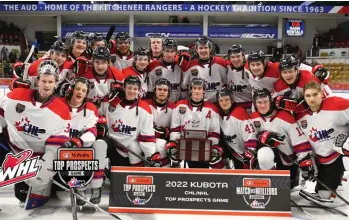  ?? ?? Team White — including team MVP Jagger Firkus and captain Denton Mateychuk — gather with the CHL/NHL Top Prospects Trophy.