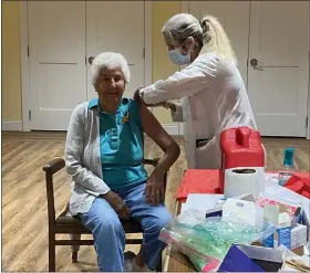  ?? COURTESY OF THE HICKMAN ?? Josie, a resident of The Hickman, celebrates her 93rd birthday by getting a flu shot.