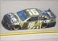  ?? Phelan M. Ebenhack / Associated Press ?? Justin Haley makes his way through Turn 4 during NASCAR Daytona 500 qualifying at Daytona Internatio­nal Speedway on Sunday.