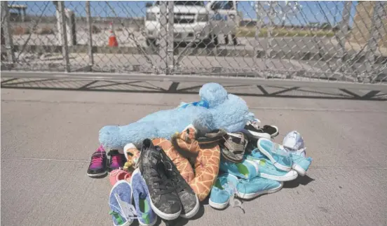  ?? SMIALOWSKI/AFP/GETTY IMAGES
BRENDAN ?? Shoes and toys left at a port of entry to the U.S. in Tornillo, Texas.