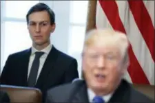  ?? EVAN VUCCI — THE ASSOCIATED PRESS ?? In this file photo, White House senior adviser Jared Kushner listens as President Donald Trump speaks during a cabinet meeting at the White House in Washington.