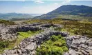  ?? ?? Remains of round houses within the hillfort of Tre’r Ceiri. Photograph: Steve Taylor ARPS/Alamy