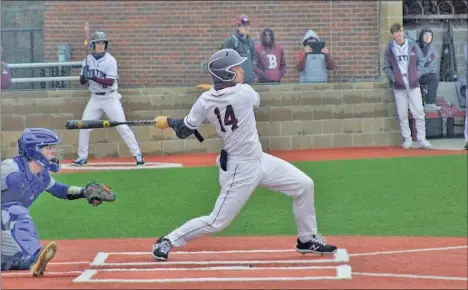  ?? TONY LENAHAN/ The Saline Courier ?? Benton senior Ethan Perry, 14, takes a cut in a game earlier this season. Perry earned Allstate honors.