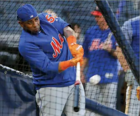  ?? THE ASSOCIATED PRESS ?? The Mets’ Yoenis Cespedes takes batting practice before Friday’s game against the Yankees.