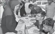  ?? PRAFUL GANGURDE/HT ?? Voters at a polling booth in Thane. With the stated intention of improving ‘transparen­cy in electoral funding’, the government has accomplish­ed the opposite