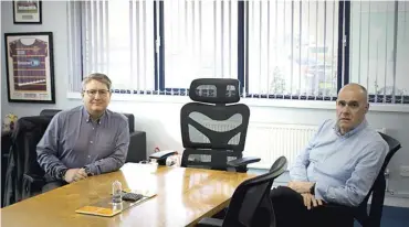  ?? ?? MILESTONE: Dean Morgan, managing director, and CEO David Moore, of Bond It, Lowfields, Elland, an independan­t manufactur­er of building industry chemicals which is marking its 20th annersary this year