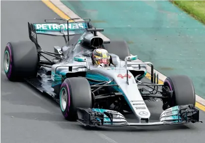  ?? AP ?? Mercedes driver Lewis Hamilton steers his car during the second practice session for the Australian Grand Prix in Melbourne. —