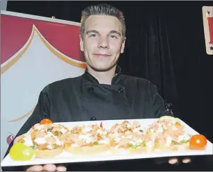  ?? COLIN MACLEAN/TC MEDIA ?? Chef Craig O’Neill with Brothers 2 shows off his restaurant’s contributi­on to this year’s Go Lobster campaign, a lobster bruschetta. In total 22 restaurant­s are participat­ing in this year’s Go Lobster campaign, which is part of the annual Summerside...