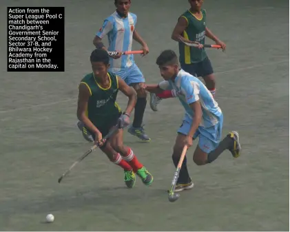  ??  ?? Action from the Super League Pool C match between Chandigarh’s Government Senior Secondary School, Sector 37-B, and Bhilwara Hockey Academy from Rajasthan in the capital on Monday.