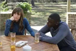  ?? JUSTIN LUBIN, THE ASSOCIATED PRESS ?? Allison Williams and Daniel Kaluuya in a scene from, "Get Out."