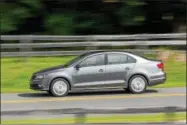  ?? WARREN BROWN — THE WASHINGTON POST ?? The 2015Volksw­agen Jetta GLI SEL is a great midsize family sedan, comfortabl­e, safe, reasonably fuel-efficient and affordable.