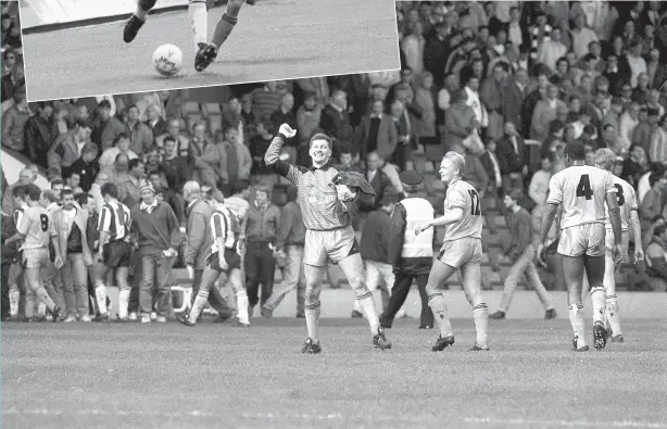  ??  ?? Wolves keeper Mark Kendall celebrates at the end of the match