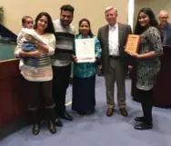  ?? MARKCULLEN.COM ?? Shanthi Kugan, centre, with Mark Cullen, second from right, and Kugan’s family including daughter Nimasha Christine, far right. On the left is her son Jeremiah with his wife Vasana and their son Isaac, Kugan’s grandson.