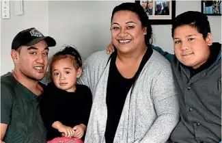  ?? FAIRFAX MEDIA NZ ?? Mose-Tuiloma with husband Lameka Nehemia, son Levi, 11, and daughter Teinaki, 2.