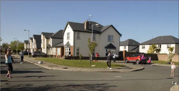  ??  ?? Residents of Ard Aoibhinn estate, Rosslare Strand who took part in some dancing in the street on Wednesday evening with instructor Olivia Doran.