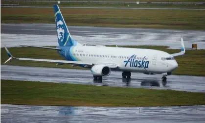  ?? Photograph: Craig Mitchelldy­er/AP ?? Alaska Airlines flight 1276, a Boeing 737-9, taxis before takeoff from Portland internatio­nal airport in Portland, Oregon, Saturday.