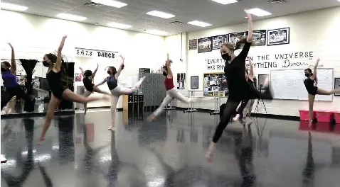  ?? The Sentinel-Record/Donald Cross ?? ■ Members of the Hot Springs Dance Troupe rehearse the dance “The New Normal” that they will perform on Thursday at the National Park College Black History Month celebratio­n.