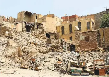  ?? Reuters ?? Wreckage of old houses in the Darb Al Labbana hillside neighbourh­ood in Cairo.