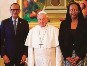  ?? AFP PIC ?? Pope Francis (centre) with Rwandan President Paul Kagame and his wife, Jeannette, at the Vatican yesterday.