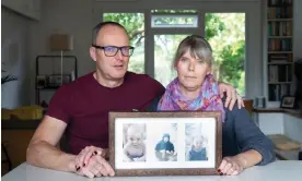  ?? Photograph: Teri Pengilley/The Guardian ?? Peter and Caroline Litman at home in Effingham, Surrey, with framed photos of their children: Alice, Harvey and Kate.