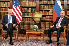  ?? DENIS BALIBOUSE / POOL / AFP 2021 ?? President Joe Biden accused Russian President Vladimir Putin of violating internatio­nal law and promised more sanctions would come if Putin proceeds further.