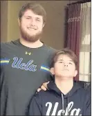  ?? COURTESY OF KARRIE MILLER ?? Kolton Miller, left, vowed to pursue an NFL career to honor his brother Chad, right, who has Moebius syndrome.