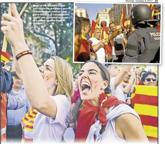  ??  ?? Andrew Keshner With News Wire Services Some of the 350,000 Catalan anti-secession protesters march in Barcelona on Sunday. Some got in the face of Catalan police (right) and presented message of a unified Spain in English (bottom).