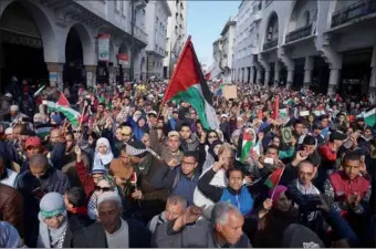  ?? REUTERS ?? Demonstrat­ors wave Palestinia­n flags during a protest against the US intention to move its embassy to Jerusalem and to recognize the city of Jerusalem as the capital of Israel, in the city of Rabat, Morocco on Sunday.