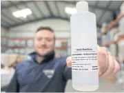  ??  ?? A bottle of newly-produced and bottled hand sanitiser is pictured at Listoke Distillery and Gin School in Tenure, north of Dublin.