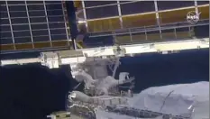  ?? AP photo from NASA video ?? NASA astronaut Shane Kimbrough (left) and French astronaut Thomas Pesquet work on the solar array outside the Internatio­nal Space Station on Sunday.