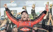  ?? Chuck Burton / AP ?? Austin Dillon celebrates in Victory Lane after winning the Daytona 500.