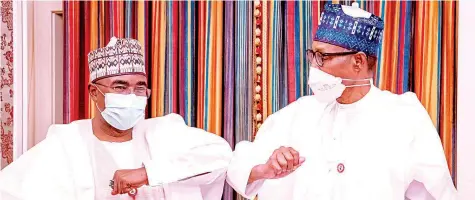  ??  ?? President Muhammadu Buhari ( right) with the Chairman of National Drug Law Enforcemen­t Agency ( NDLEA), Mohammed Buba Marwa at the State House, Abuja, during a visit by Marwa to brief him on the activities of the agency… yesterday