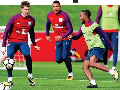  ?? REX ?? City bankers: Stones (left) and Sterling (right) can help book England’s place at Russia 2018
