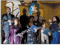  ?? The New York Times/MARK ABRAMSON ?? The gospel choir — which sings liturgical music often in Hebrew — performs during the Rosh Hashana service at the Unitarian Church of All Souls in New York on Monday.