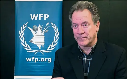  ??  ?? David Beasley, the new executive director of the World Food Programme, which has been using blockchain to keep a record of transactio­ns, is making sure recipients get their goods without added costs.