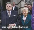  ??  ?? Julie with Robbie Coltrane