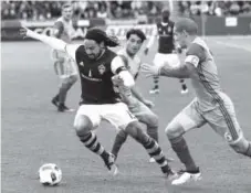  ?? Patrick Traylor, The Denver Post ?? Jermaine Jones, left, scored three goals and two assists in nine games since joining the Rapids in March.